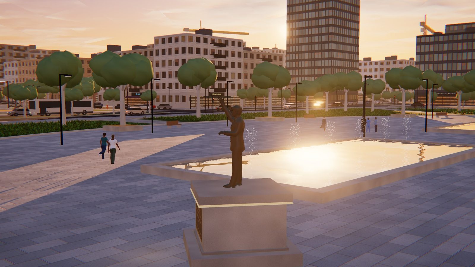 A mayor's bronze statue on its plinth on the hall square at sunset